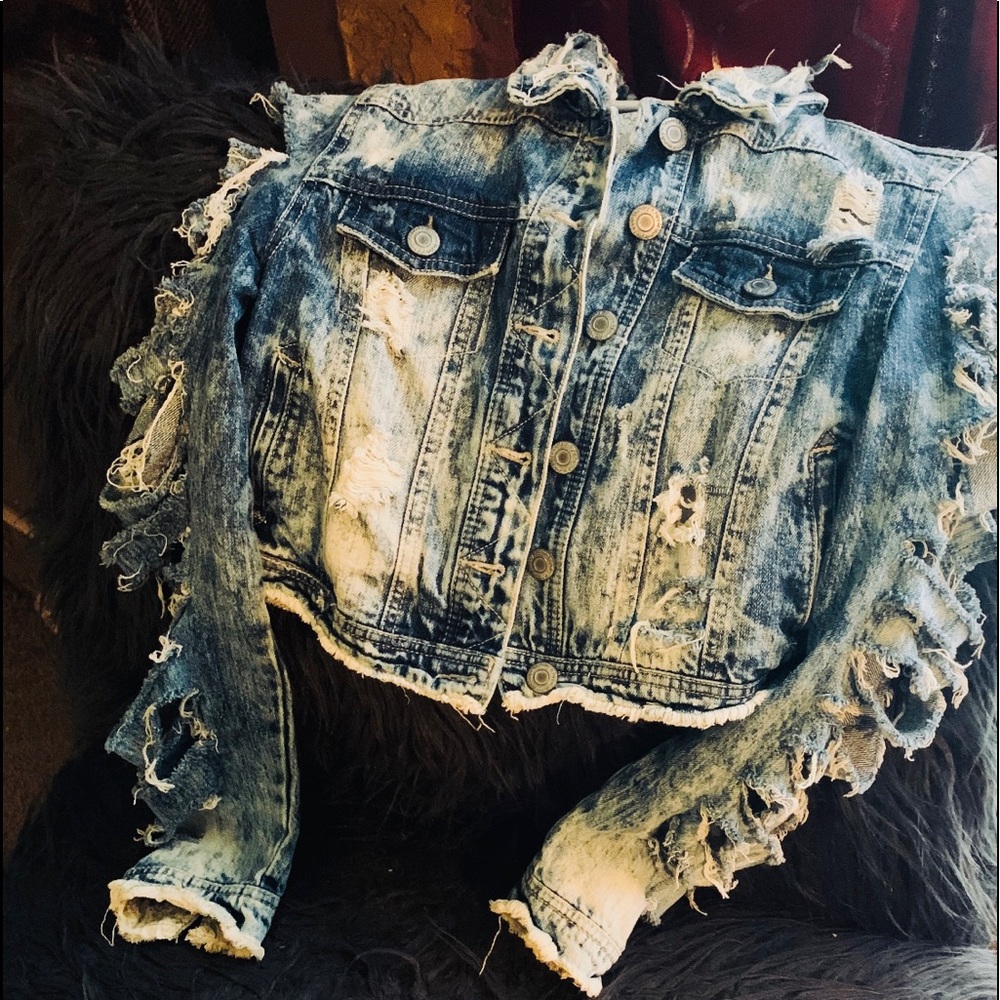 Distressed denim jacket